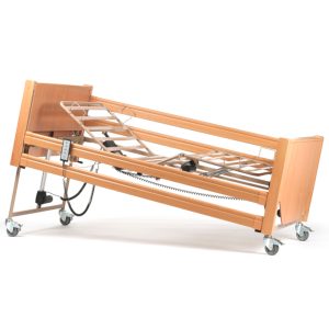Lit de soins réglable avec 4 moteurs et accessoires incluant potence, barrières et roues freinées